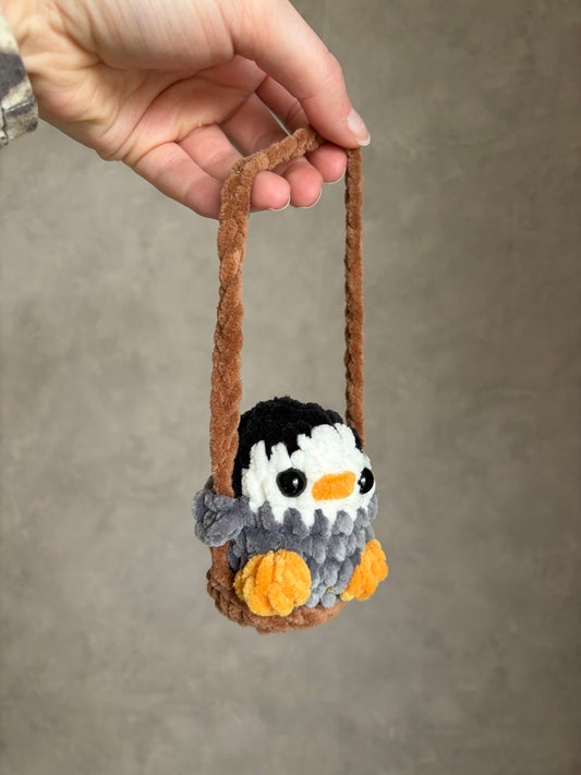 Pinguy sur sa balançoire