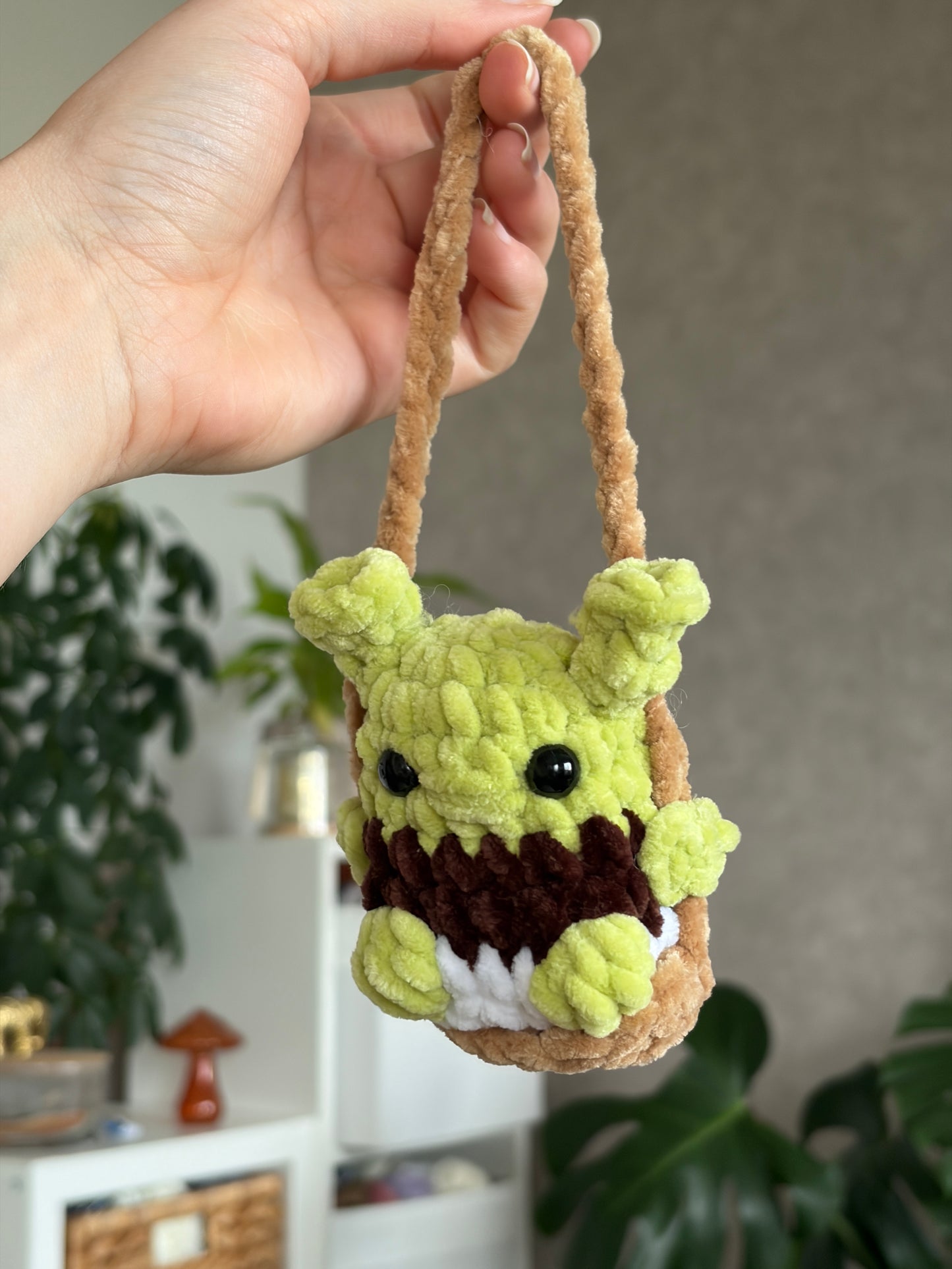 Shrek sur sa balançoire