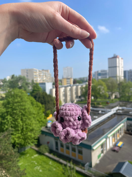 Pieuvre sur sa balançoire