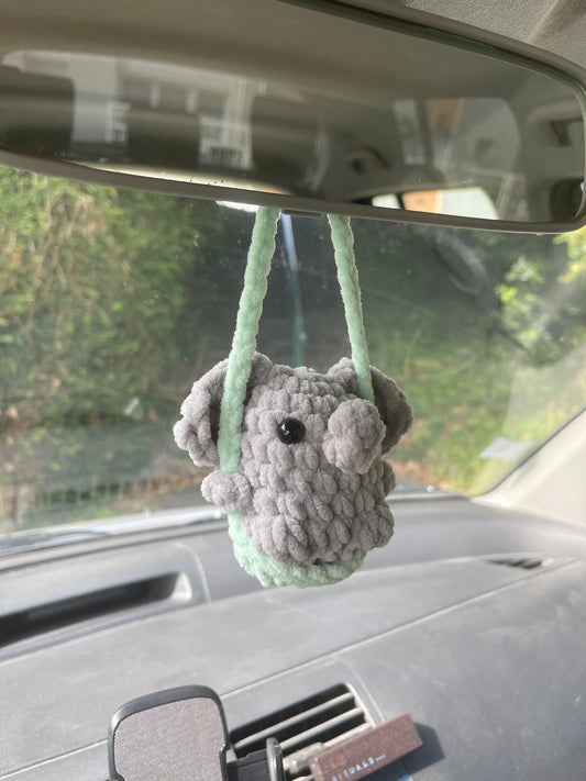 Éléphant sur sa balançoire